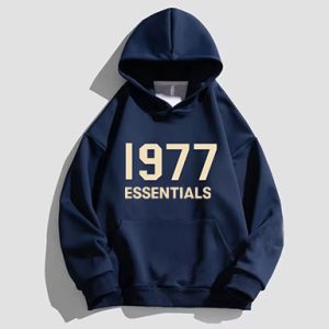 1977 Essentials Designer Hoodie in Dark Blue. Premium quality, stylish, and comfortable. Perfect for everyday wear. Limited stock—shop now before it's gone