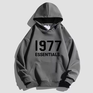 The 1977 Essentials Designer Hoodie with a black logo provides a sleek, stylish look, soft fleece lining, and all-day comfort.