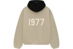 The 1977 Essentials NBA Heat Hoodie in Wheat combines comfort and style, featuring bold team branding for a trendy, casual look.