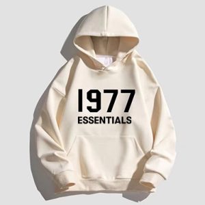 1977 Essentials Designer Hoodie in cream delivers effortless style with a soft fleece lining, adjustable hood, and subtle embroidered logo.