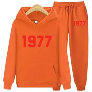 Shop the 1977 Essentials Women’s Tracksuit Line in Orange for a sleek, trendy look. Perfect blend of comfort and style for any occasion.
