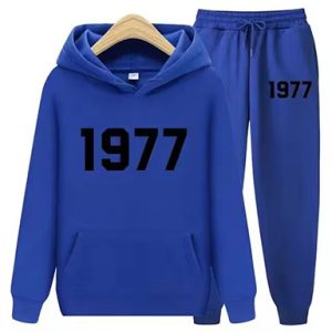 Shop the 1977 Essentials Trendy Women’s Tracksuit in Line Blue. Perfect for workouts or casual wear, offering style, comfort, and a flattering fit.