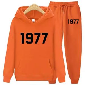 Shop the 1977 Essentials Women's Tracksuit Collection in Orange. Modern design, comfort, and performance for active women.