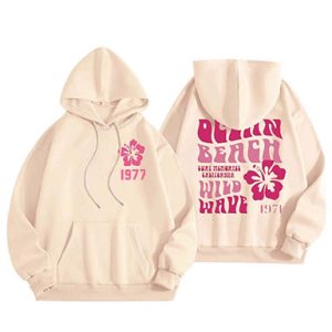 Shop the Wild Wave 1977 Essentials Graphic Hoodie for ultimate comfort and retro style. Perfect for everyday wear and casual outfits.