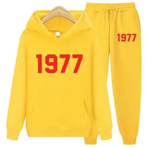 Shop the 1977 Essentials Iconic Tracksuit for Women. Modern, comfortable, and stylish activewear perfect for workouts or casual outings.