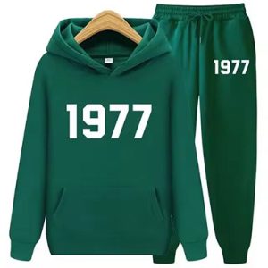Shop the 1977 Essentials Women's Tracksuit Collection in Green. Modern design, comfort, and performance for active women.