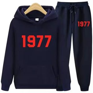 Shop the 1977 Essentials Iconic Tracksuit for Women in black . Modern, comfortable, and stylish activewear perfect for workouts or casual outings.
