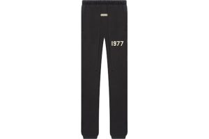 Shop the Fear of God Essentials Elasticized Cuffs 1977 Sweatpants in Iron for a sleek, comfortable fit. Perfect for casual wear and effortless style.
