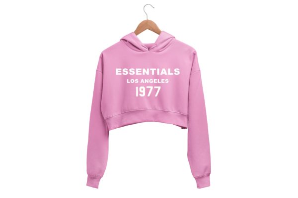 Shop the 1977 Essentials Crop Hoodie for women Pink A cozy, cropped design with retro 1977 graphic. Perfect for casual and athleisure wear.