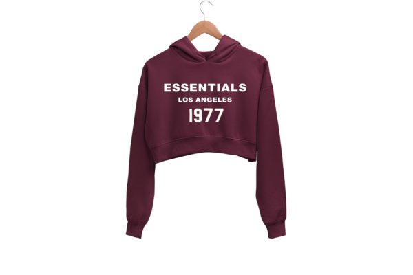 Shop the 1977 Essentials Crop Hoodie for women Maroon A cozy, cropped design with retro 1977 graphic. Perfect for casual and athleisure wear.