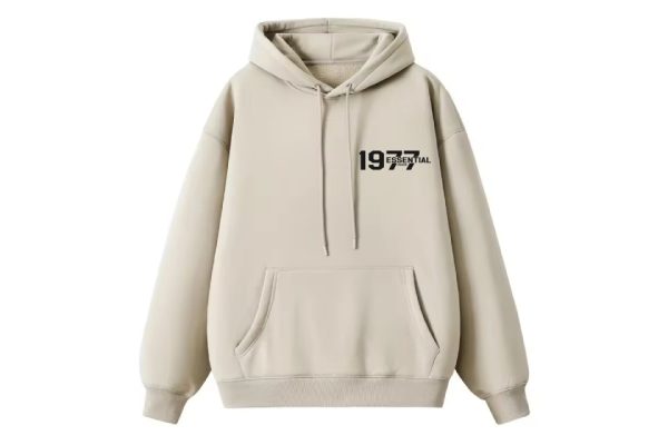 The 1977 Essentials Hoodie in Timeless Grey combines comfort, style, and versatility, featuring a relaxed fit and soft cotton blend for everyday wear.