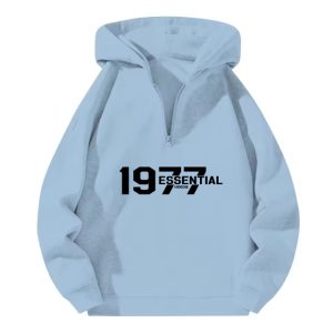 The 1977 Essential Half-Zip Hoodie in Cozy Sky Blue combines classic style with modern comfort, offering a relaxed fit for all-day casual wear.