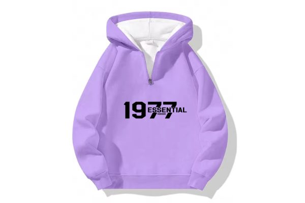 The 1977 Essentials Half-Zip Hoodie in Cozy Purple combines premium comfort, relaxed fit, and timeless style, perfect for casual everyday wear.