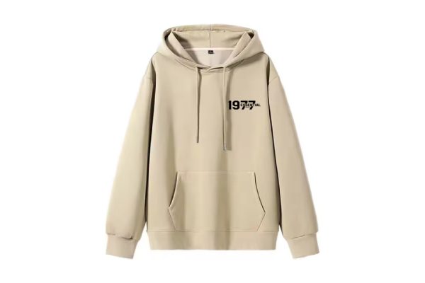 The 1977 Essentials Hoodie in Beige combines minimalist design, cozy fit, and versatility, making it the perfect addition to any casual wardrobe.