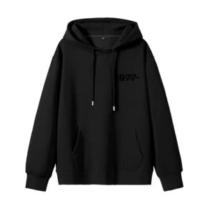 The 1977 Essentials Hoodie in Black offers minimalist style and ultimate comfort, making it a versatile, everyday piece for effortless and timeless fashion.