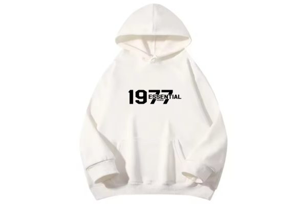 The 1977 Essentials Hoodie in White combines style and comfort with a sleek design, perfect for everyday wear. Stay cozy and fashionable all day long.