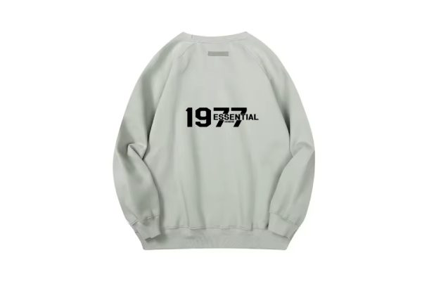 Discover the 1977 Essentials Sweatshirt for ultimate comfort and style. Perfect for daily wear, lounging, and casual outings. Made from premium materials