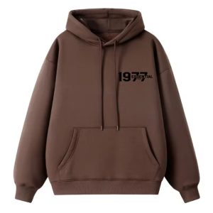 The 1977 Essentials Hoodie, where simplicity meets style. Crafted for comfort and versatility, this hoodie is the perfect addition to any wardrobe