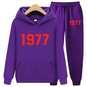 Shop the 1977 Essentials Women's Tracksuit Collection in Purple. Modern design, comfort, and performance for active women.
