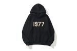 The Oversized 1977 Essentials Trendy Black Hoodie combines comfort and style with a bold, vintage-inspired design. Made from soft, high-quality fabric, it offers a relaxed, oversized fit perfect for layering or casual wear. 