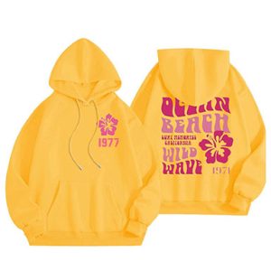 Shop the Wild Wave 1977 Essentials Graphic Hoodie Yellow for ultimate comfort and retro style. Perfect for everyday wear and casual outfits.
