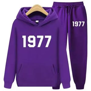 Shop the 1977 Essentials Trendy Women’s Tracksuit in purple. Perfect for workouts or casual wear, offering style, comfort, and a flattering fit.