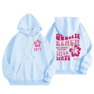 1977 Essentials Graphic Hoodie in Sky Blue offers premium comfort, bold ocean-inspired design, and a relaxed unisex fit for casual, stylish wear