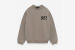 Shop the 1977 Essentials Fleece Crewneck in Heather Gray. Soft, warm, and durable, this classic pullover sweatshirt is perfect for casual wear and comfort.