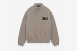 Shop the 1977 Essentials Fleece Polo. Soft fleece interior, classic polo design, and comfortable fit. Perfect for casual wear or layering.