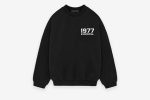 Shop the 1977 Essentials Fleece Crewneck in Desert Sand. Soft cotton, fleece interior, chest logo, and a classic fit for warmth, comfort, and everyday style.