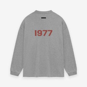 Shop the 1977 Essentials Jersey Long Sleeve Tee in Dark Heather. Soft, breathable, and versatile for casual wear or layering. Perfect fit and style.