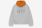 Shop the 1977 Essentials WNBA Hoodie Cozy fleece fabric, adjustable hood, and a versatile wardrobe essential for every season.