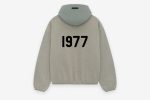Shop the 1977 Essentials Liberty Hoodie. Soft fabric, bold design, and comfortable fit, perfect for showing your team spirit in style.