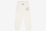 Shop the 1977 Fleece Essential Sweatpant in White for ultimate comfort and style. Perfect for casual wear and relaxation.