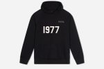 The 1977 NICCE Men's Multi Logo Hoodie in black features a stylish multi-logo design for a bold, urban look. Perfect for casual wear.