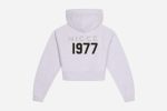 The 1977 NICCE Women's Ersa Cropped Zip-Through Hoodie offers a stylish, comfortable fit with a modern cropped design, perfect for casual wear.