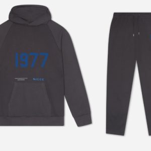 The 1977 NICCE Men's Script Essentials Tracksuit. Stylish comfortable and versatile perfect for everyday wear. Elevate your wardrobe with this classic set.