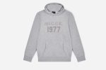 Shop the 1977 NICCE Juniors Mercury Hoodie in Dark Grey for ultimate comfort and style. Soft, stylish, and perfect for everyday wear.