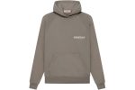 The Essentials Hoodie Desert Taupe combines soft cotton blend fabric, a relaxed fit, and an adjustable hood for everyday comfort.