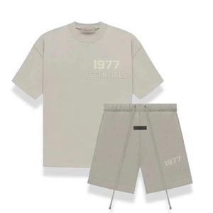The 1977 Essentials Seafoam Full Set offers ultimate comfort and style, including a hoodie, joggers, and matching accessories.