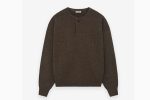 The Essentials Fine Knit Henley in Mocha offers breathable comfort, a button placket, and versatile, timeless style for everyday wear.