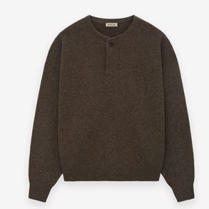 The Essentials Fine Knit Henley in Mocha offers breathable comfort, a button placket, and versatile, timeless style for everyday wear.