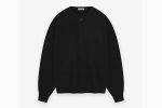The Essentials Fine Knit Henley offers comfort and style with its breathable fabric, button placket, and versatile, timeless design.