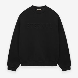 The Essentials Eternal Fleece Crewneck offers premium comfort with a soft fleece interior, timeless design, and durable cotton construction