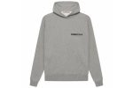 The Essentials Women's Hoodie (SS22) in Dark Oatmeal offers comfort, style, and versatility with a relaxed fit, soft fabric, and minimalistic design.