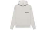 The Essentials Women's Hoodie (SS22) in Light Oatmeal offers a relaxed fit, soft cotton-blend fabric, and minimalist style for everyday comfort.